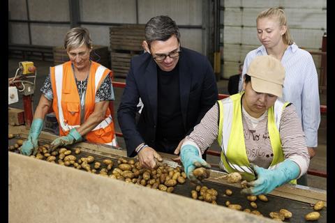 Andy Burnham inspects potatoes at FG Pryor & Son